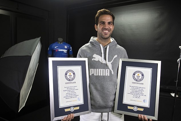 Chelsea star Cesc Fabregas receives his second Guinness World Record after becoming the fastest player to reach 100 Premier League assists (Photos)