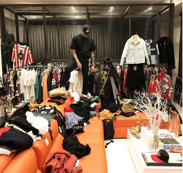 Chris Brown shows off his walk-in closet as he complains he's out of space for his clothes (Photo)