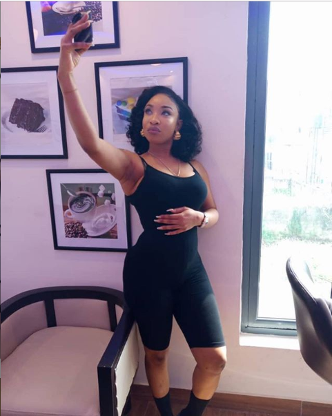 Tonto Dikeh cradles her tummy amidst speculation she is pregnant